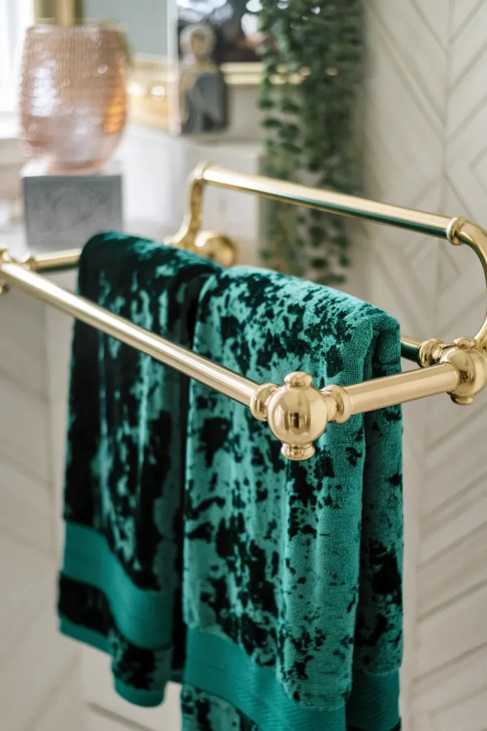 bathroom with gold finsished bars and 