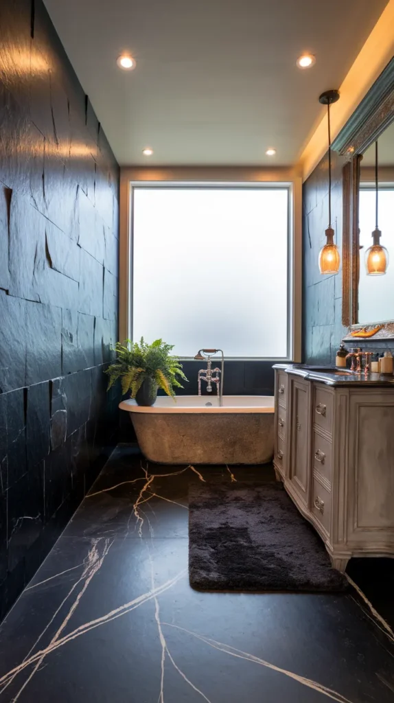 Urban loft-style bathroom with matte black industrial tiles, brushed nickel fixtures, and caged Edison bulb pendants.