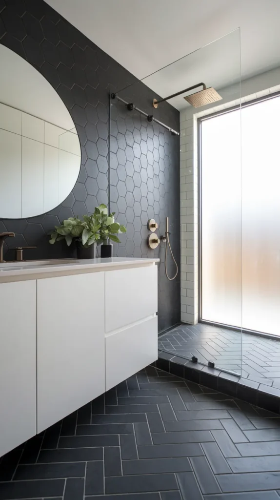 Industrial bathroom with textured black concrete floors, exposed copper pipes, and a reclaimed wood vanity.